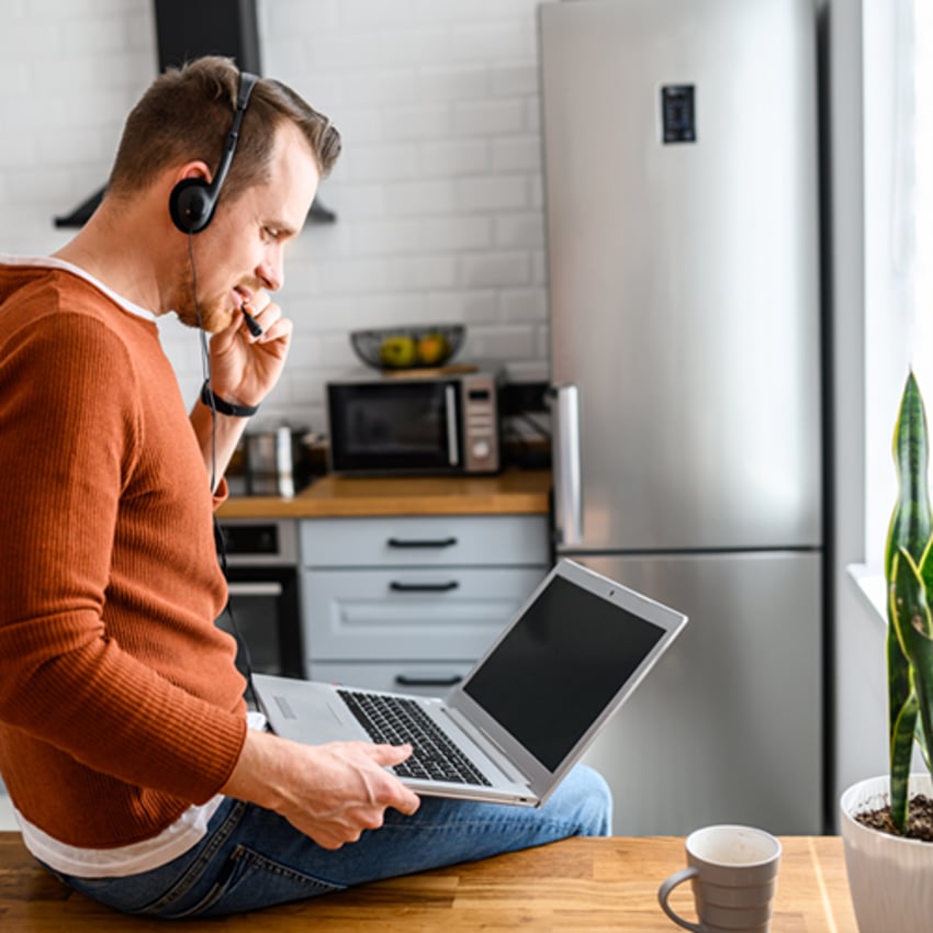 Man talking on computer